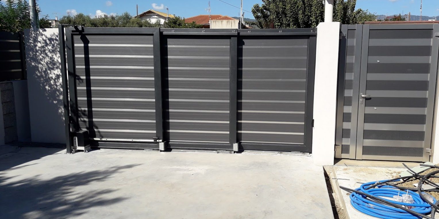 συρόμενη τριπλή τηλεσκοπική γκαραζόπορτα